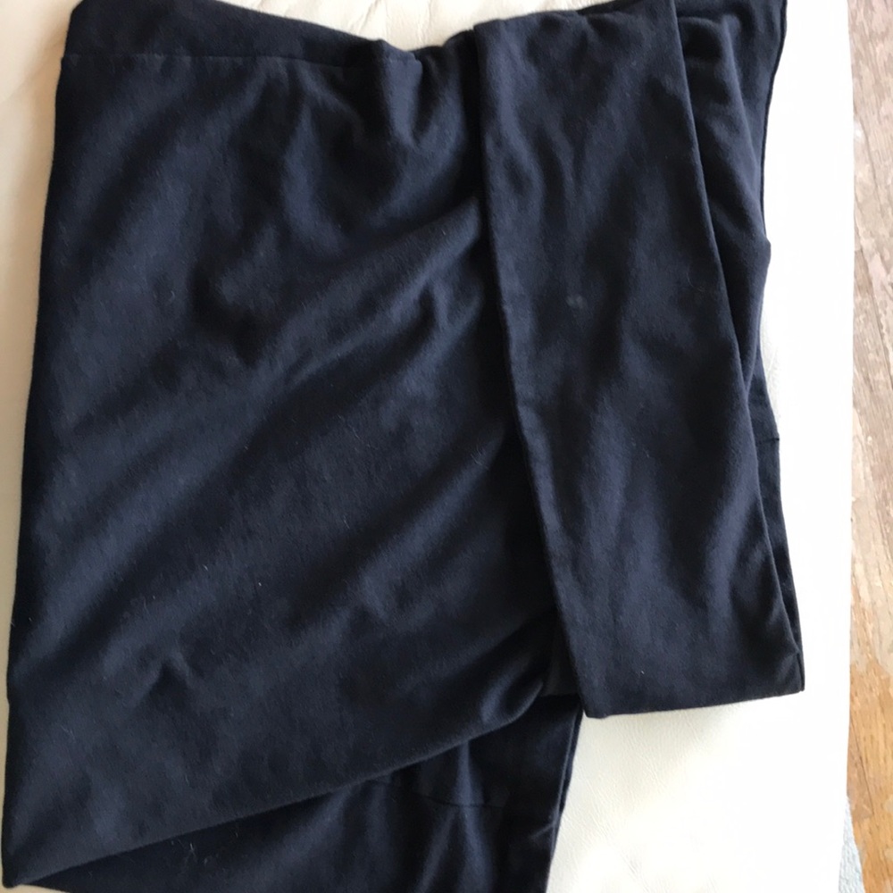 Gorgeous black bodycon skirt with wrap detail.